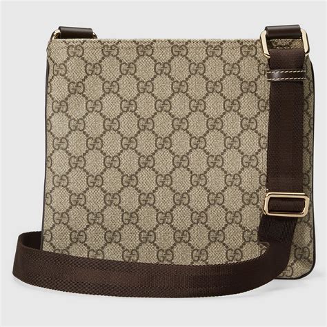 gucci cross body messenger bag.